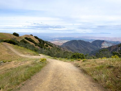 Scenic mountain road trail overlooking road valley views