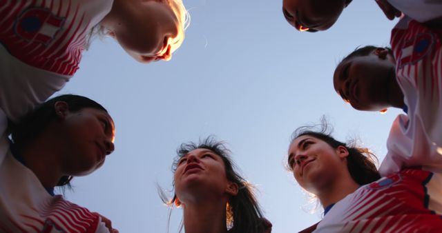 Low Angle View of Female Soccer Team in Huddle Before Game - Download Free Stock Images Pikwizard.com