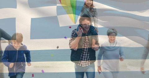 Walking multigenerational family carrying child on shoulders with kite and flag overlay