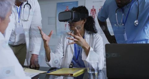 Female doctor using vr headset for medical training, team collaboration and diagnostics