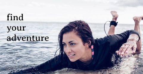 Woman Emerging from Ocean Promoting Adventure and Determination - Download Free Stock Templates Pikwizard.com