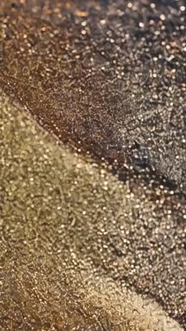 Glittering Abstract Texture in Bronze and Gold Tones