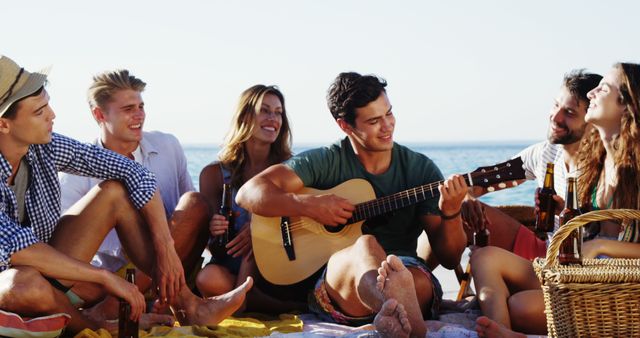 Friends Enjoying Beach Party with Guitar and Drinks - Download Free Stock Images Pikwizard.com