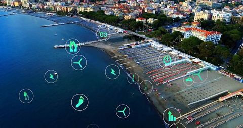 Aerial View of Sustainable Urban Beach Resort with Energy Icons