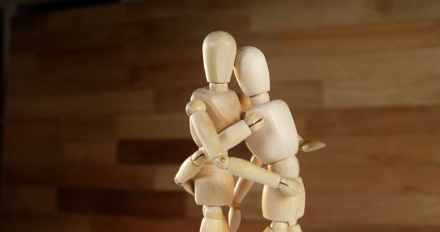 Close-up of romantic couple figurines embracing each other