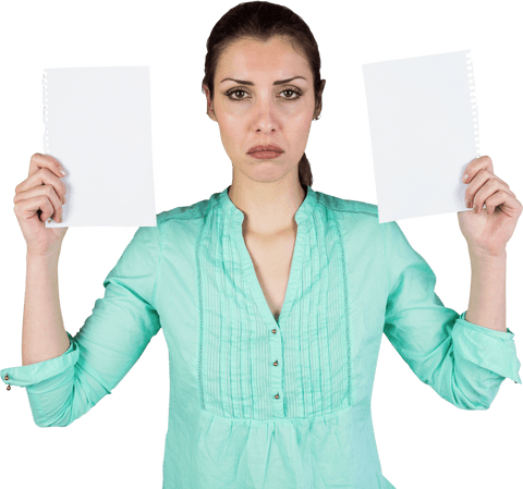 woman standing with sad expression, holding two blank sheets of paper. use for presentations or visual projects requiring overlay effects. ideal for concepts related to frustration, decision making, or paperwork challenges.