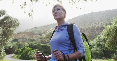 Senior Woman Trekker Enjoying Scenic Mountain View - Download Free Stock Images Pikwizard.com