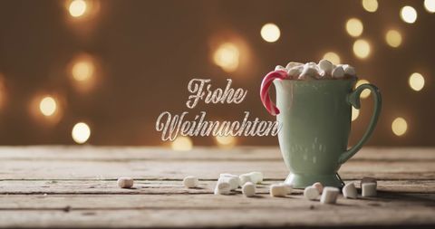 Frohe Weihnachten with Hot Chocolate and Festive Lights - Download Free Stock Images Pikwizard.com