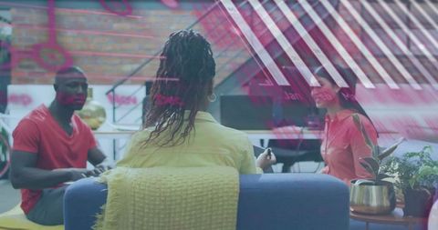 Creative team collaborating in modern coworking lounge with digital brainstorming overlay