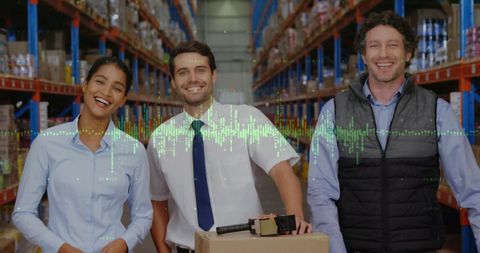 Diverse team utilizing data technology in warehouse logistics