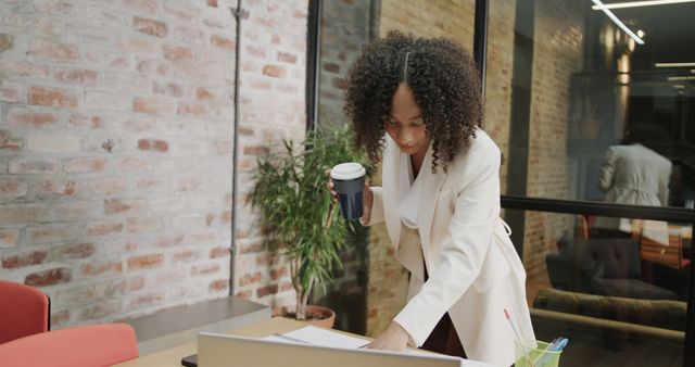 Young Businesswoman Working at Office Desk with Coffee - Download Free Stock Images Pikwizard.com