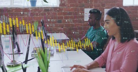 Diverse Professionals Working on Financial Data Analysis in Office