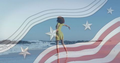 Woman walking on sunlit beach with american flag overlay and reflective shoreline