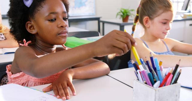 Diverse Young Students in Classroom Selecting Drawing Tools - Download Free Stock Images Pikwizard.com