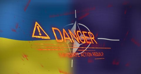 Global danger warning with ukraine and nato symbolism
