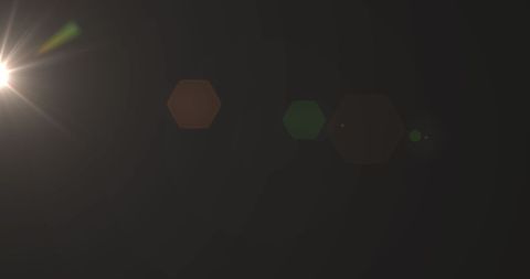 Abstract Light Flare Glowing on Dark Background