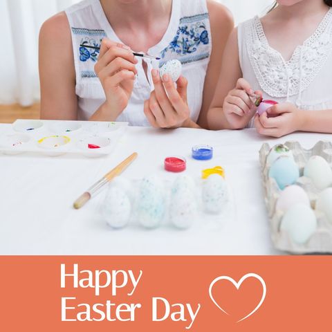 Mom and Daughter Decorating Easter Eggs Together at Home