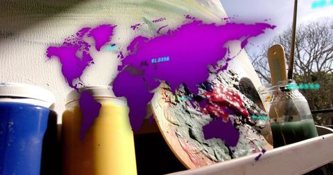 Sunlit artist palette on balcony with paint jars, solvent jar and purple world map overlay