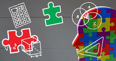 Colorful puzzle pieces with educational icons