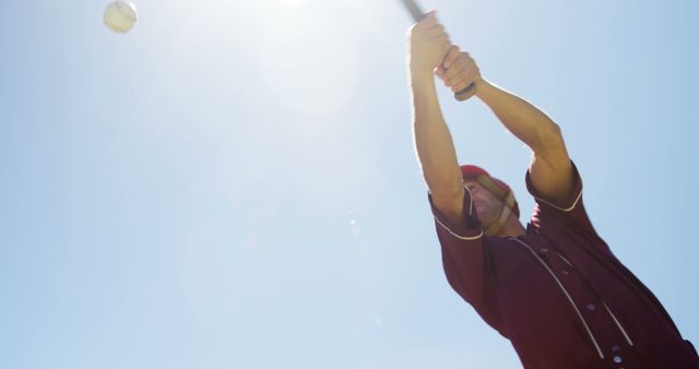 Baseball Player Swinging Bat Ready to Hit Ball in Bright Sunlight - Download Free Stock Images Pikwizard.com