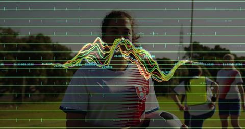 Athlete Holding Soccer Ball with Fitness Data Overlaid