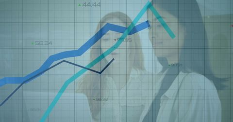 Businesswomen discussing data with financial graph overlay