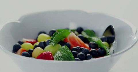 Fresh Fruit Salad in White Bowl with Scalloped Edge