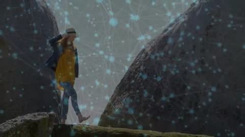 Adventurous Hiker Crossing Ledge Balancing in Rocky Wilderness