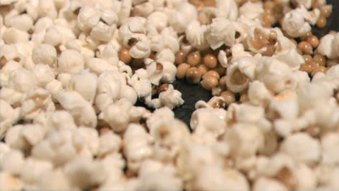 Close-Up of Popcorn Unfolding in Slow Motion