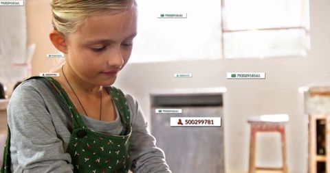 Child crafting clay art in cozy sunlit kitchen ambiance