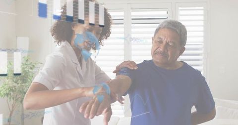 Caregiver helping senior man walk at home providing support and mobility assistance