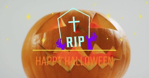 Festive Halloween Pumpkin with RIP Tombstone and Happy Halloween Text - Download Free Stock Images Pikwizard.com