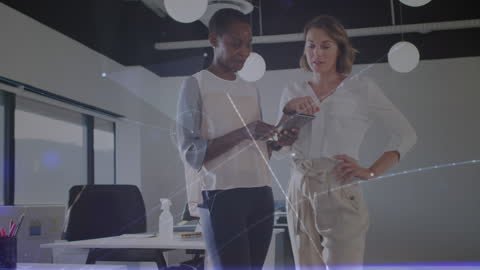 Diverse Businesswomen Networking in Modern Office with Technology Overlay