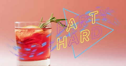 Trendy party cocktail with neon text on pink background