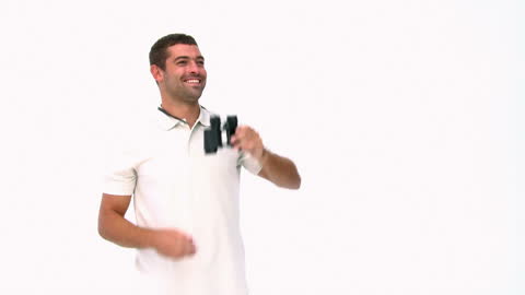 Smiling Man Using Binoculars Against White Background