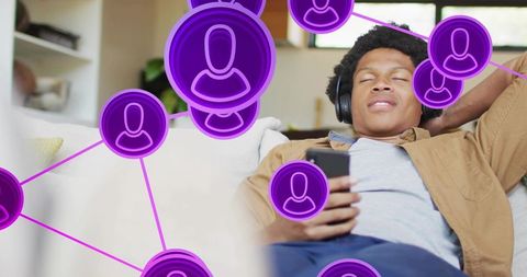 Relaxing man using smartphone and headphones with purple social network overlay
