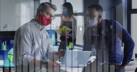 Business Professionals Analyzing Finance Data Amidst Pandemic