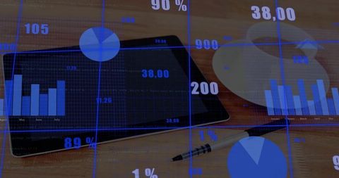 Digital analytics overlaid on office desk with tablet