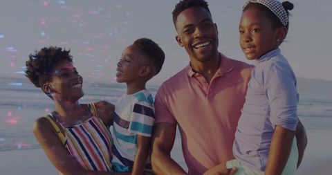 Joyful Family Bonding at Calm Ocean Shoreline