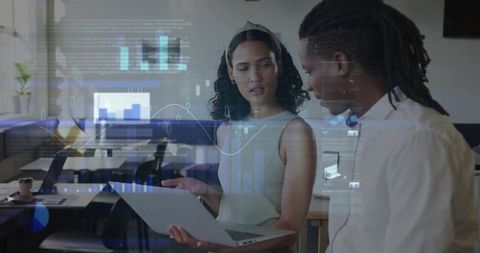 Coworkers Analyzing Data with Digital Charts Overlay