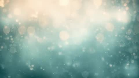 Teal bokeh particles drifting with warm golden glow, floating dust motes cinematic loop