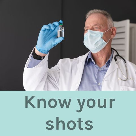 Doctor Holding Vaccine For Immunization Awareness Campaign - Download Free Stock Templates Pikwizard.com
