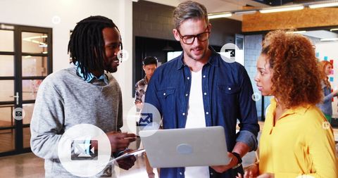 Innovative Team Collaborating with Digital Interface in Modern Office