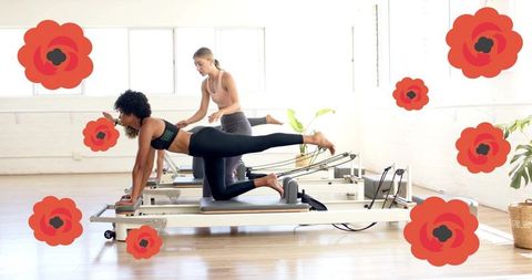 Pilates reformer instructor guiding leg extension for core strength and balance