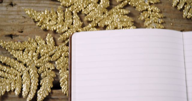 Open Notebook with Glittering Golden Leaves on Rustic Wooden Table - Download Free Stock Images Pikwizard.com