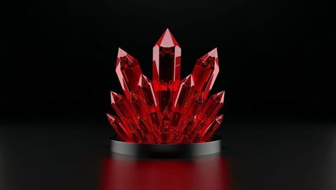 Deep red crystal cluster glowing on metal pedestal with reflective black surface