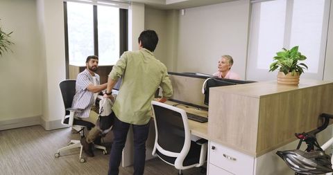 Business meeting in a modern office reception area