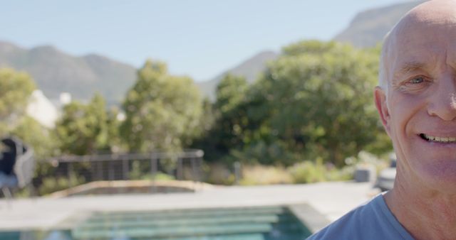 Smiling Middle-Aged Man Outdoors by Pool - Download Free Stock Images Pikwizard.com