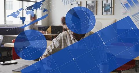 Senior professional on laptop in modern office environment