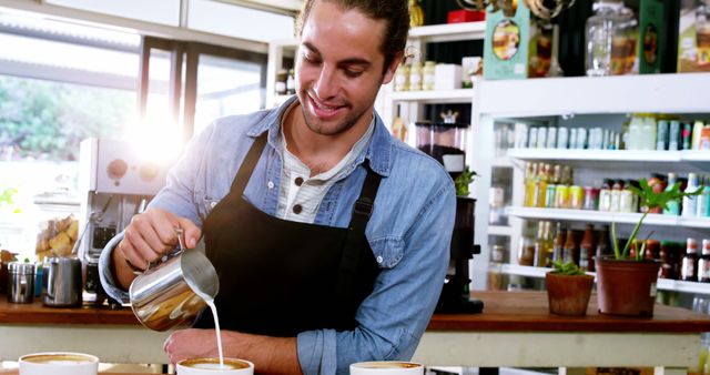 Young Barista Pouring Milk into Coffee Cups in Cafe - Download Free Stock Images Pikwizard.com